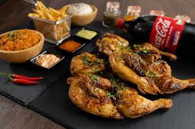 Demi poulet grille a la machine